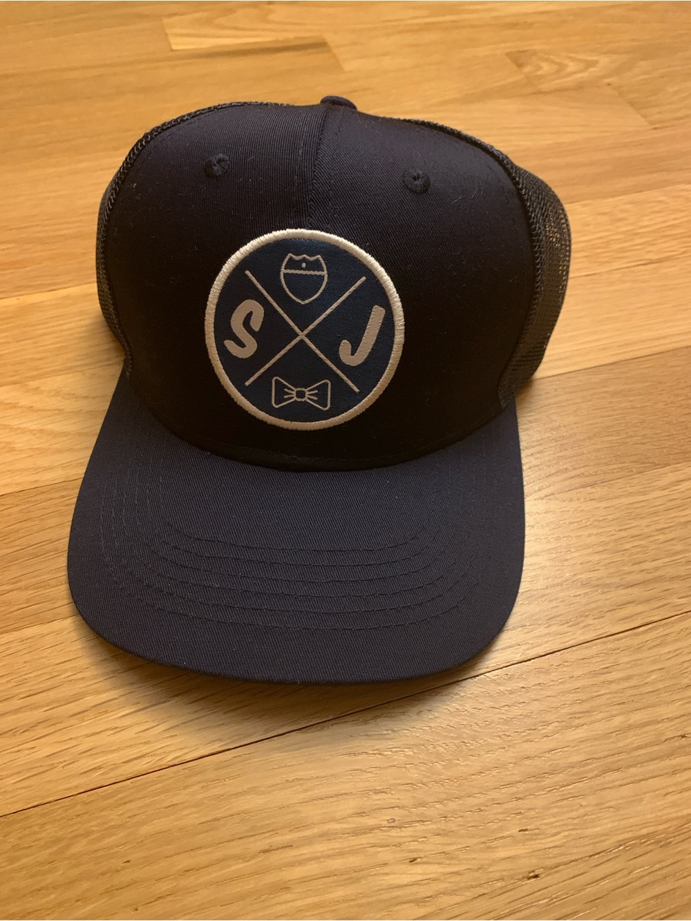 Classic Navy Trucker Hat with Embroidered Crest